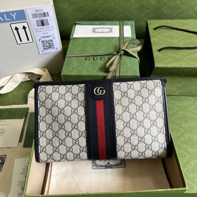 G*u*i clutch bags